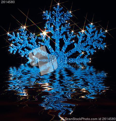 Image of twinkling blue snowflake