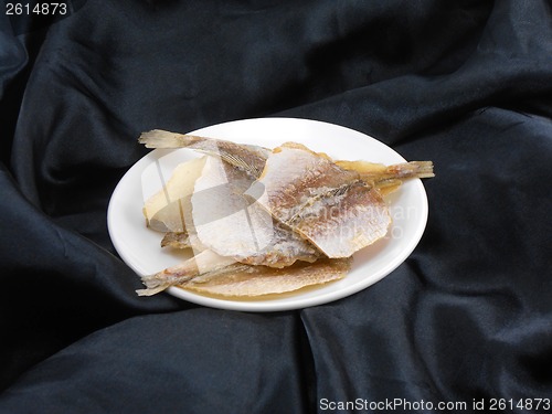 Image of Sea bream fish on a white plate