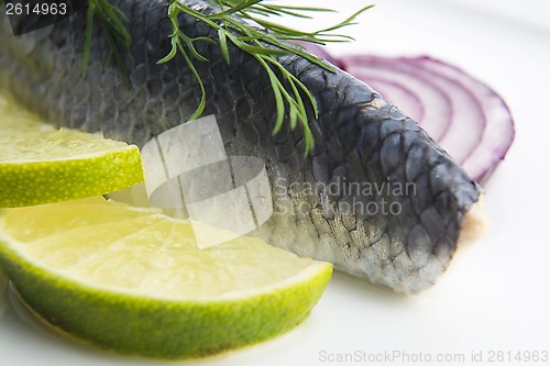 Image of Fillet herring with onion and lemon