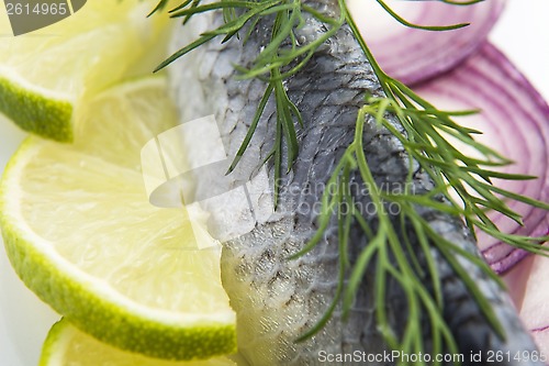 Image of Fillet herring with onion and lemon