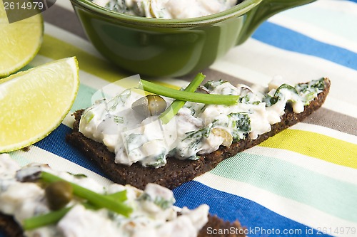 Image of sandwiches with dark bread, herrings, mushrooms, pepper