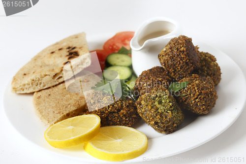 Image of Plate of falafel with breat and salad