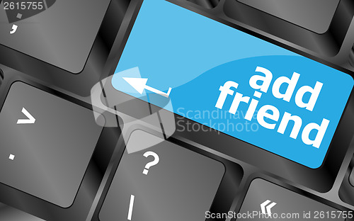 Image of Keyboard with blue add friend button, social network concept