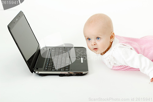 Image of baby with laptop