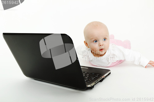 Image of baby with laptop