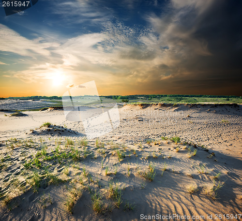 Image of Cloudy sky over desert