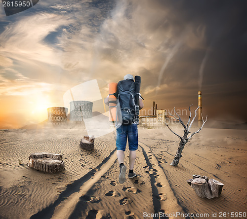 Image of Tourist in a sandy desert