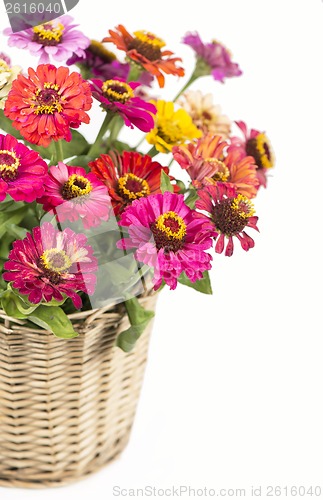 Image of Bouquet from different brights in a basket