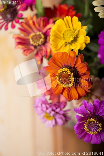 Image of bouquet of beautiful wild flowers in a wattled basket