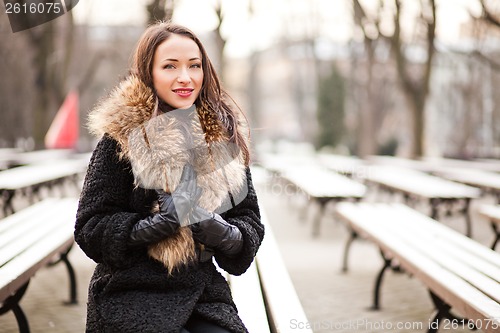 Image of Business woman laughing in the park