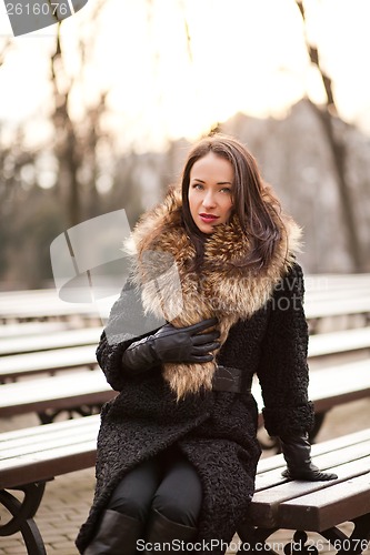 Image of Business woman laughing in the park