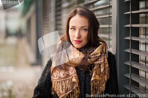 Image of Business woman wearing scarf