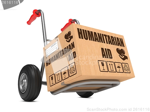 Image of Humanitarian Aid - Cardboard Box on Hand Truck.