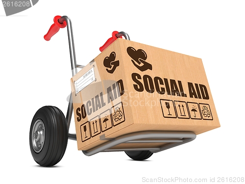 Image of Social Aid - Cardboard Box on Hand Truck.