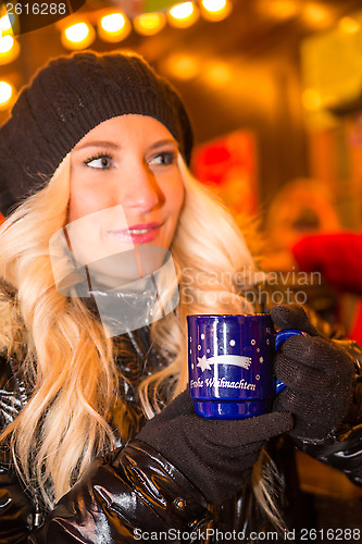 Image of Young on Christmas Market