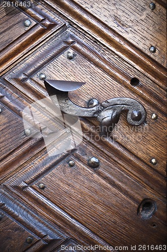 Image of Old metal door handle, close-up
