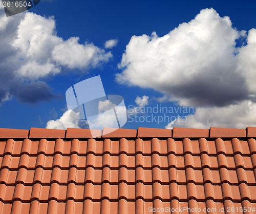 Image of Roof tiles and cloudy sky