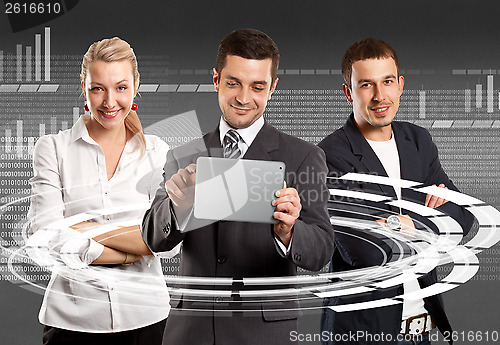 Image of Business Team With Touch Pad