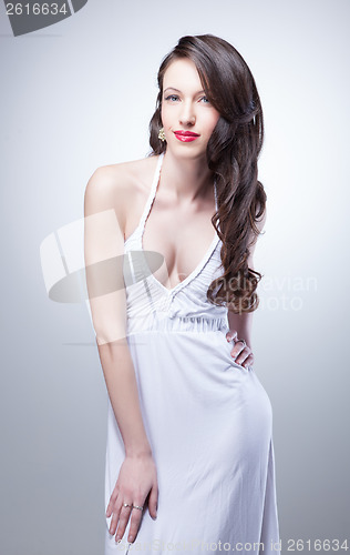 Image of portrait of sexy woman in white dress