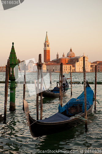 Image of Gondolas and San Giorgio Maggiore church on Grand Canal in Venic