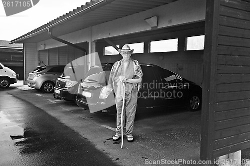 Image of A man and cars