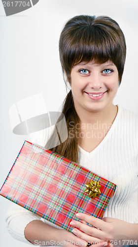 Image of young woman with packaged gift