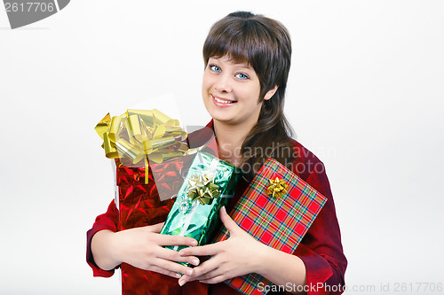 Image of young woman with packaged gifts