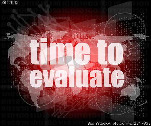 Image of Time concept: words Time to evaluate on digital screen