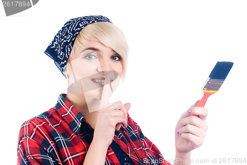 Image of Young woman with paintbrush