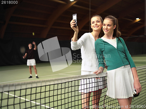 Image of people have a rest after tenis s