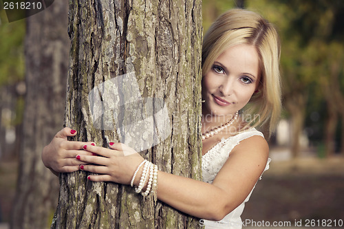 Image of Embracing a tree