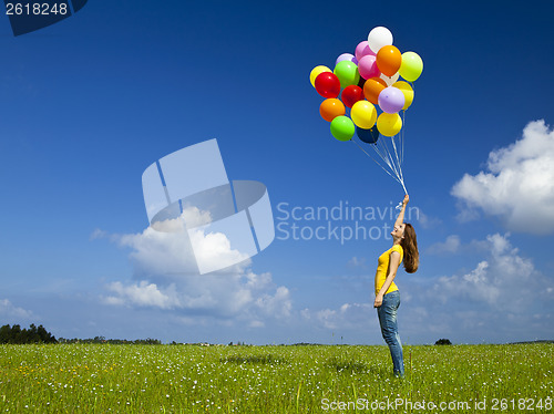 Image of Girl with colorful balloons