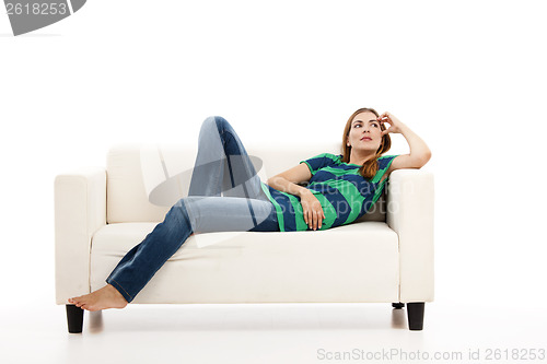 Image of Woman at the sofa thinking