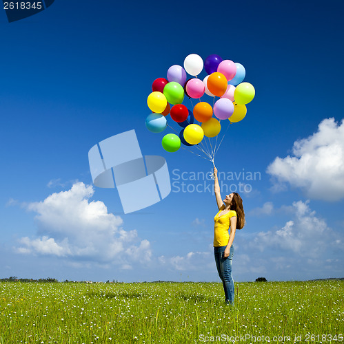 Image of Girl with colorful balloons