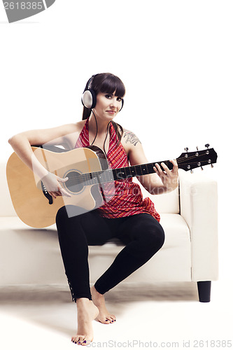 Image of Playing guitar