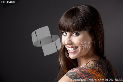 Image of Woman with tattoos