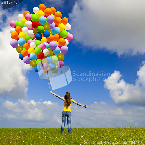 Image of Girl with colorful balloons