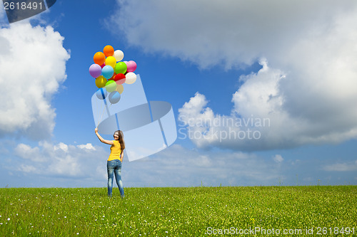 Image of Girl with colorful balloons