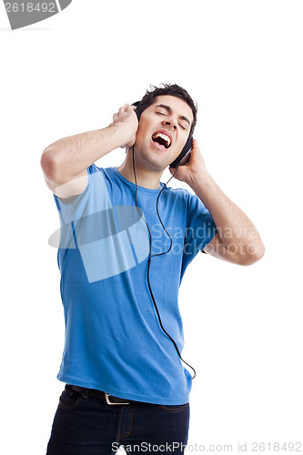 Image of Young man listen music