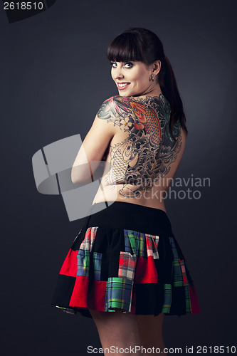 Image of Woman with tattoos