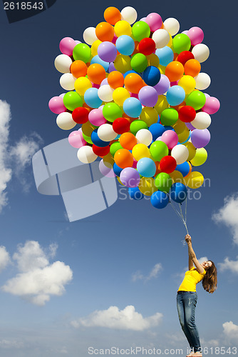 Image of Girl with colorful balloons