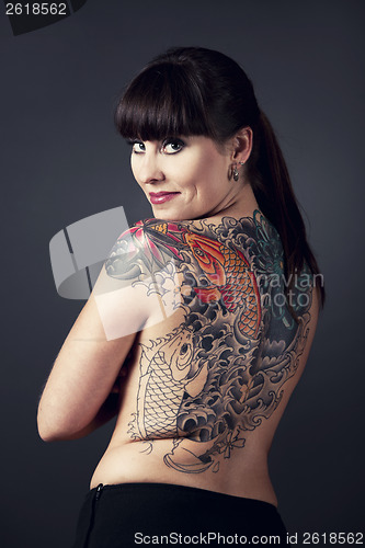 Image of Woman with tattoos