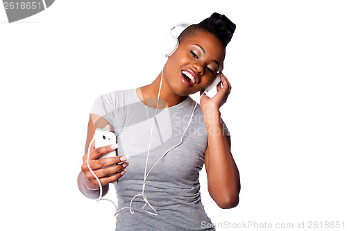 Image of Beautiful woman listening to music