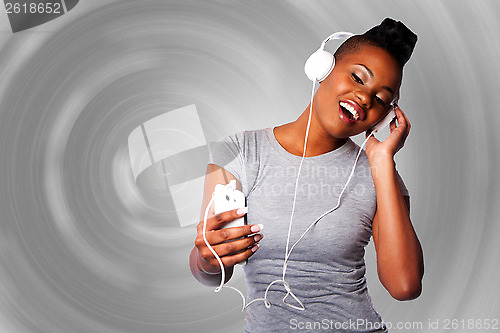 Image of Beautiful woman listening to music