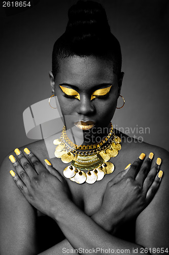 Image of African tribal in gold