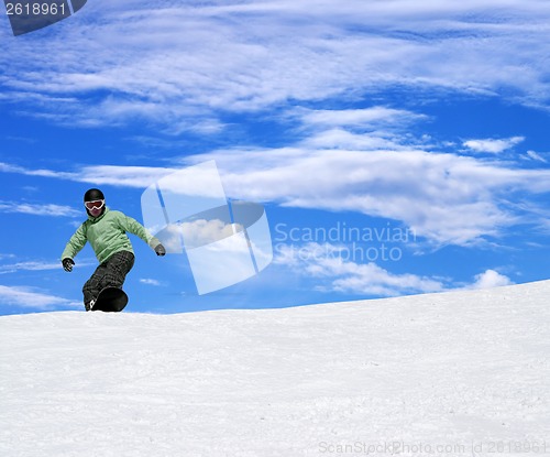 Image of Snowboarder on ski slope