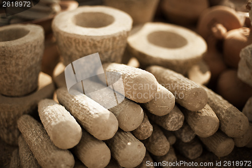 Image of Stone products on market in Myanmar. Mortars and pestles close u