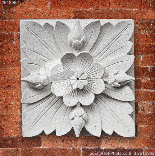 Image of Stone lotus flower decoration on the wall of the temple on Bali 