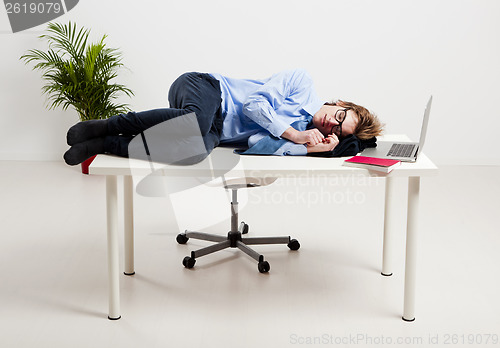 Image of Sleeping in the office