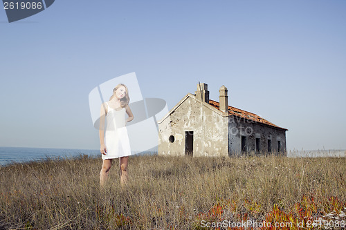 Image of Woman in a white dress